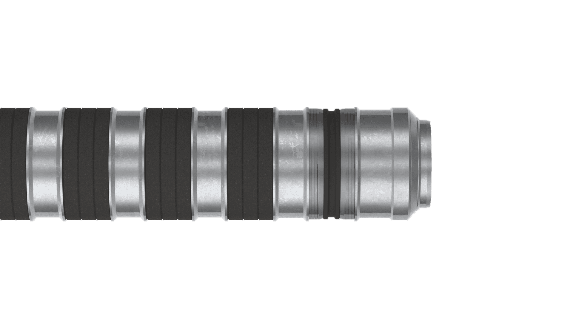 Close-up of the Welltec WAI, a metallic cylindrical object with alternating dark and light rings, resembling a part of a machine or equipment.