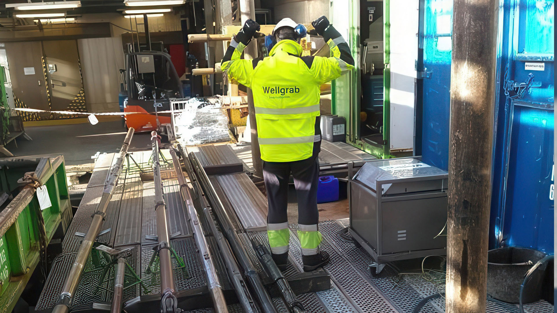Wellgrab technician preparing equipment on-site for the first-time application of a Wellgrabber tool to retrieve a stuck cable