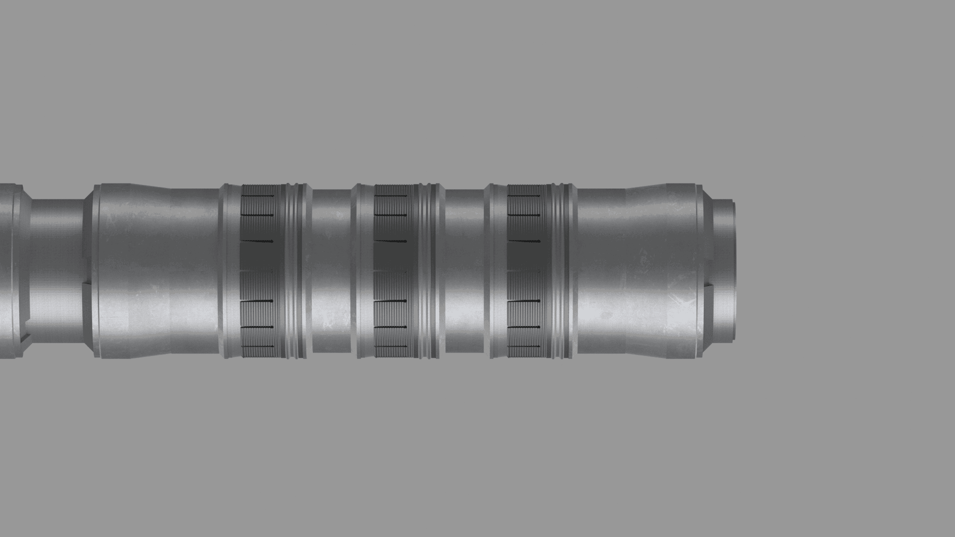 Detailed view of a metal tube from a Welltec® Expandable Anchor (WEA) on a black backdrop.